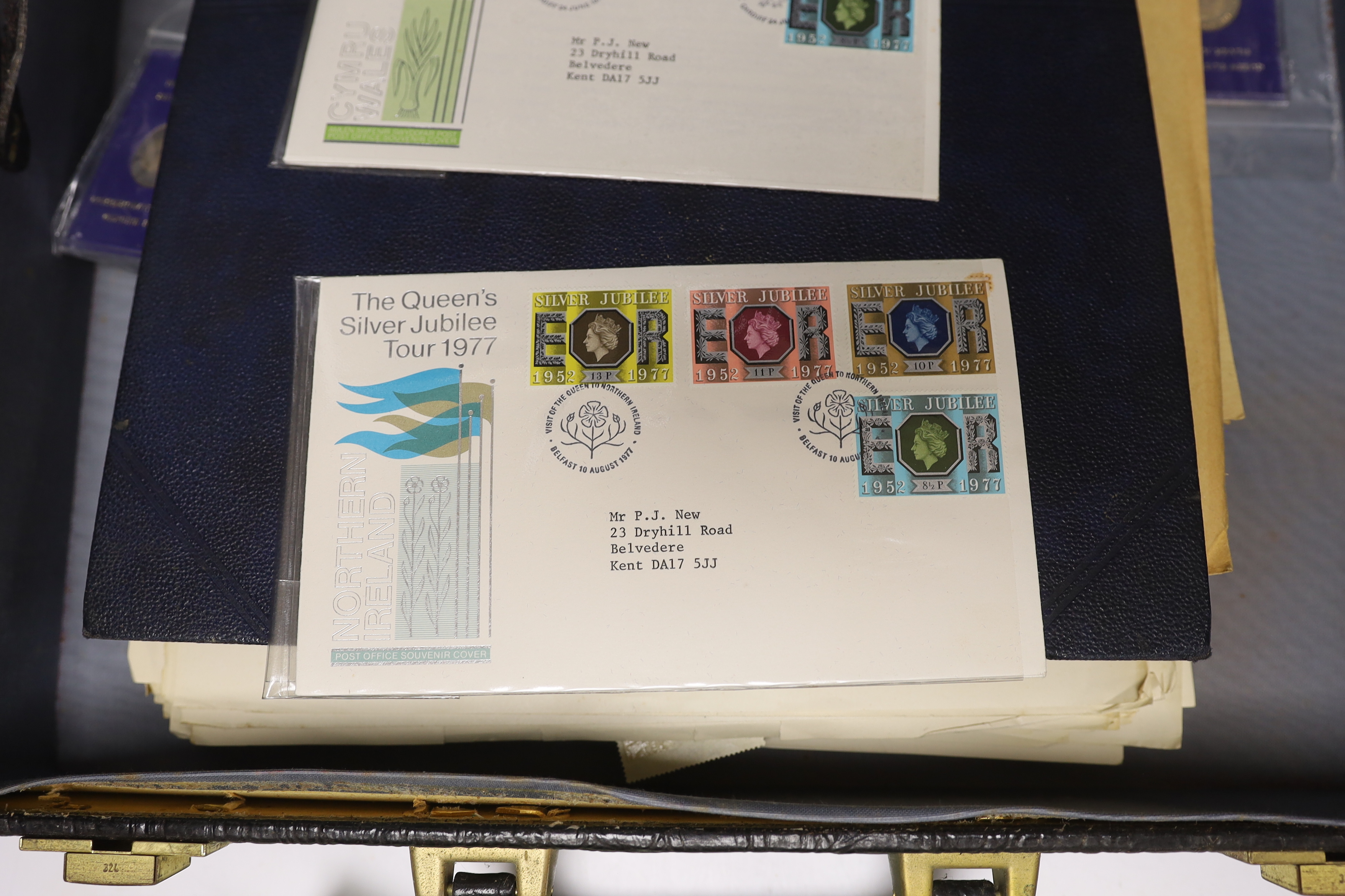 An album of British and Commonwealth stamps, mostly George V - George VI, many unused and various first day covers